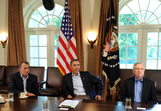 Speaker of the House John Boehner (R-Ohio), President Barack Obama and Senate Majority Leader Harry Reid (D-Nev.) (Getty Images)